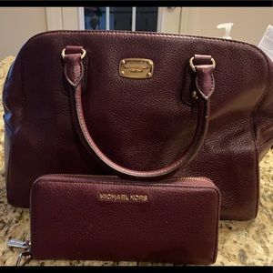 Michael kors leather bag & matching wallet.